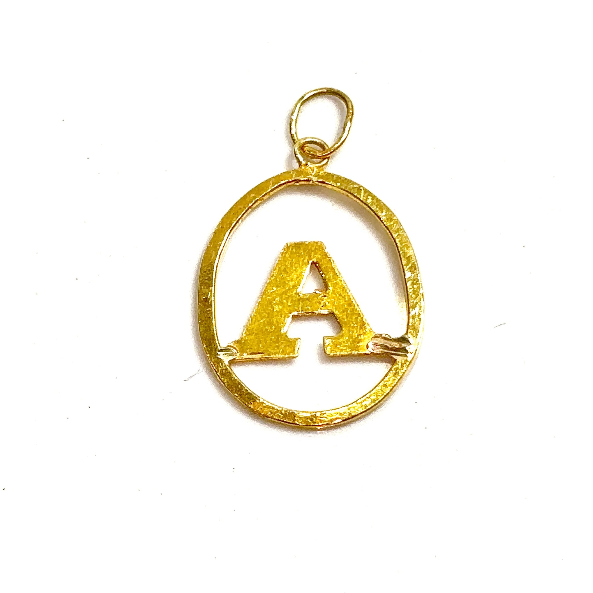 A Pendant - 14 carat gold
