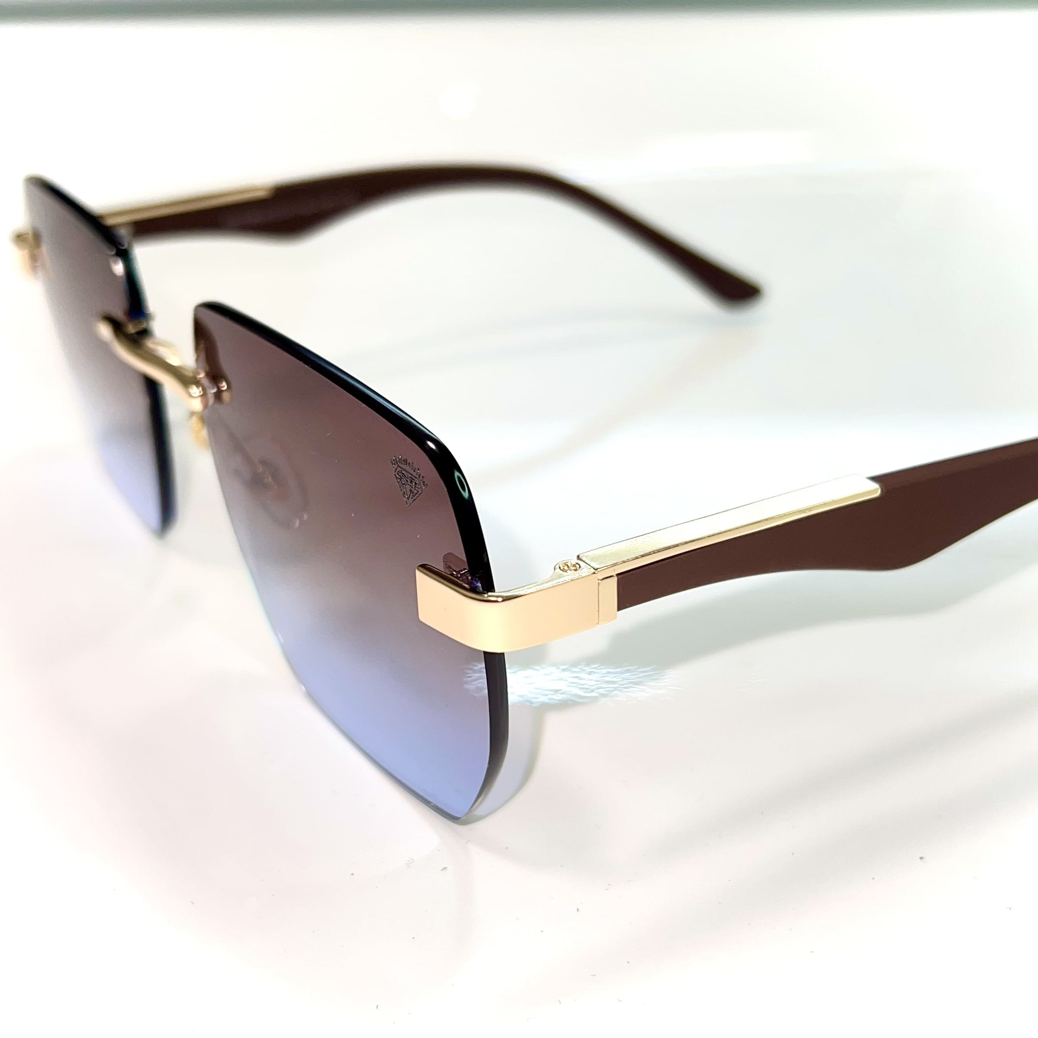 Dubai Glasses - 14 carat gold plated / Silicon side - Brown/Blue Shade - Sehgal Glasses